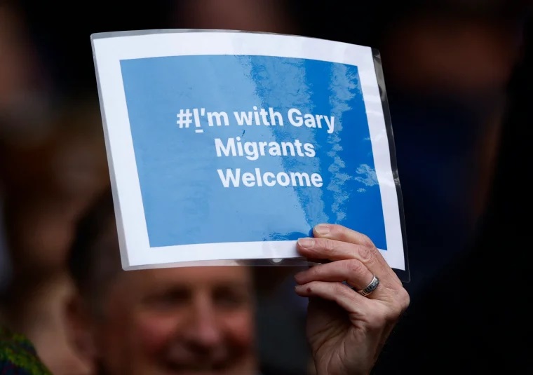 Fan raises placard of support at Leicester City